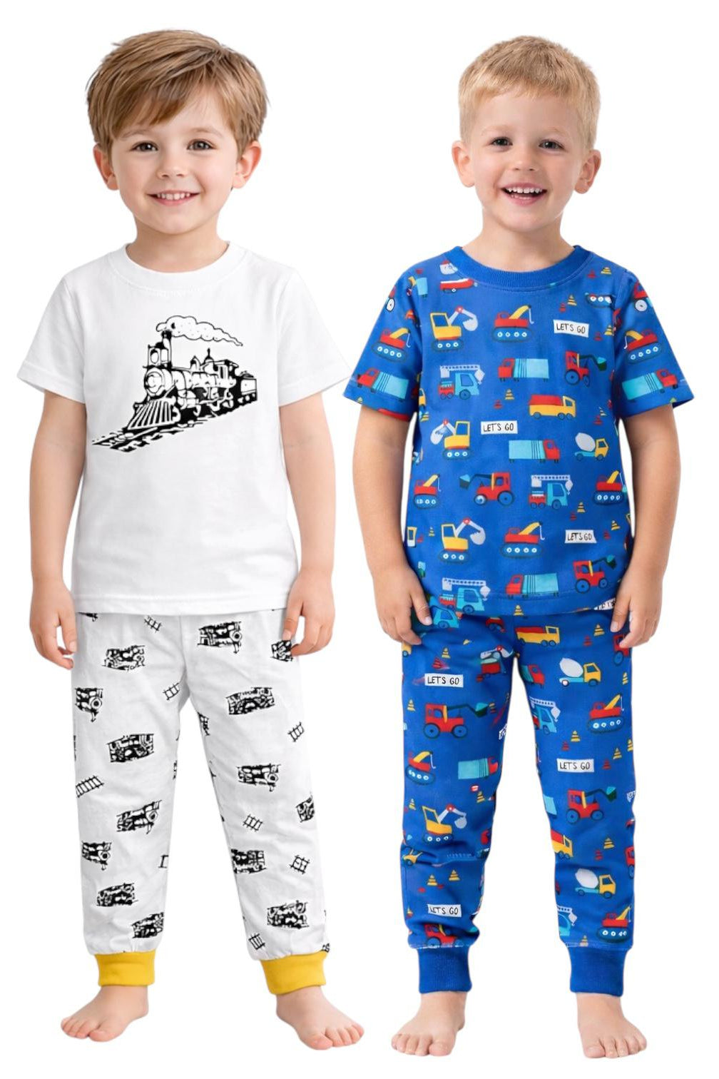 Two children wearing pajama sets with train and vehicle patterns on a white background