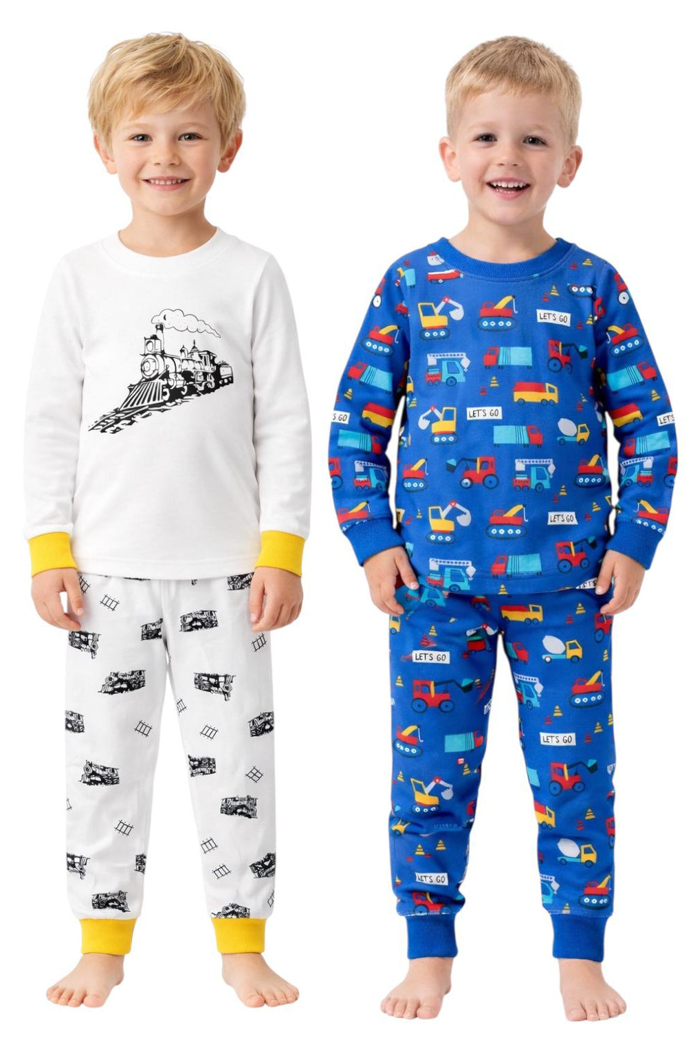 Two children wearing pajamas with train and vehicle patterns on a white background